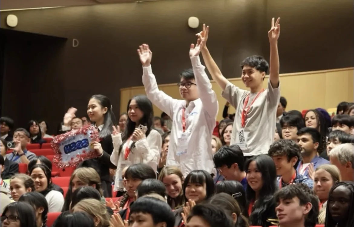 JSSF 2025 participants celebrating together in an auditorium
