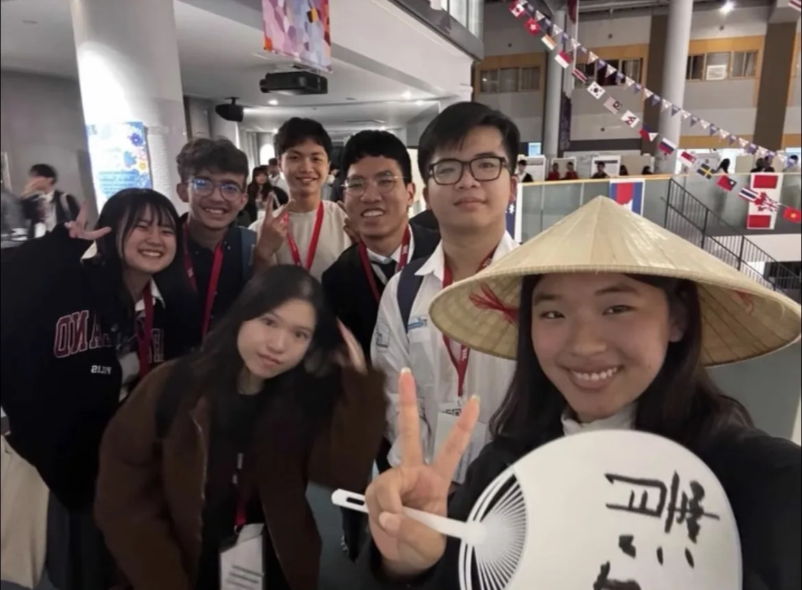 A group of JSSF 2025 participants posing together at the international event